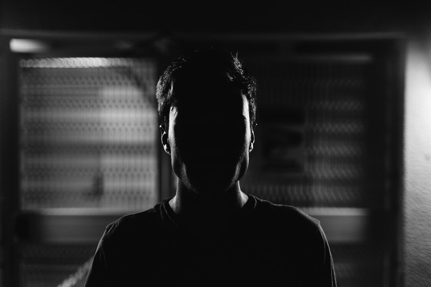 Anonymous face in the shadows Anonymous face in the shadows