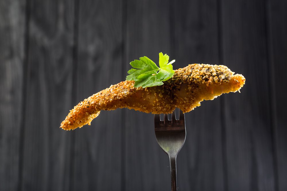 crunchy fried fish on fork crunchy fried fish on fork
