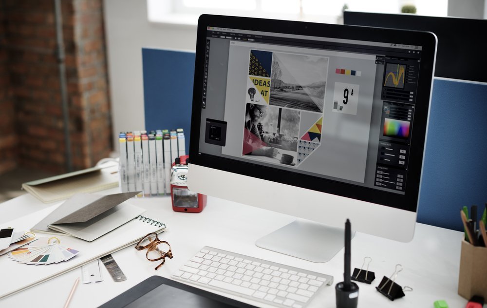 Person designing brand on computer Person designing brand on computer