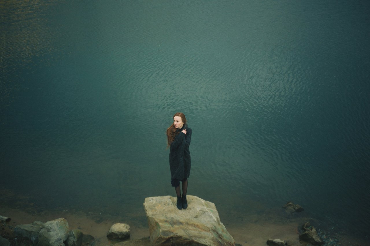 girl-standing-alone-on-rock girl-standing-alone-on-rock