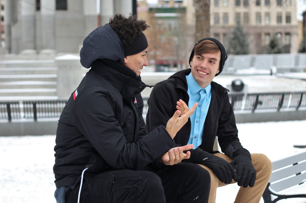 two-guys-friendly-conversation two-guys-friendly-conversation