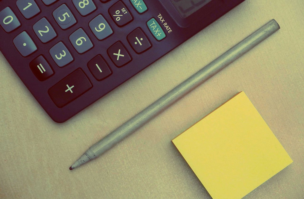 calculator, pen and sticky notes calculator, pen and sticky notes