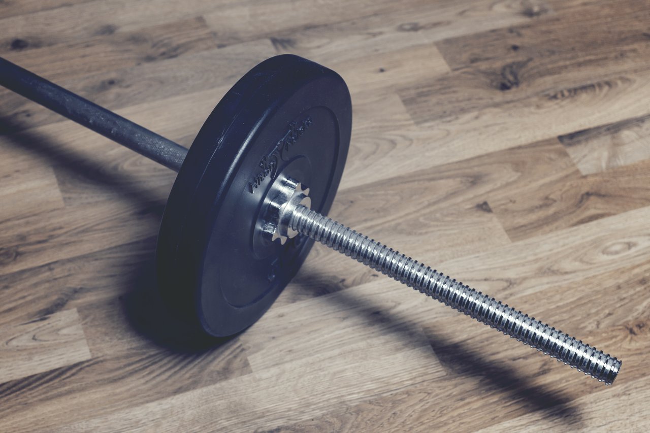 A large barbell with which to stimulate muscle growth.