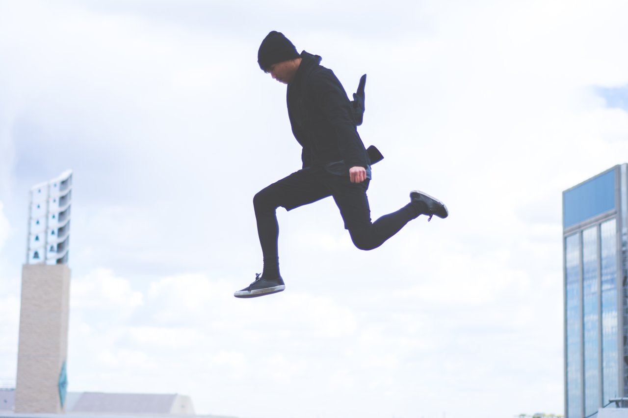teen taking a leap teen taking a leap