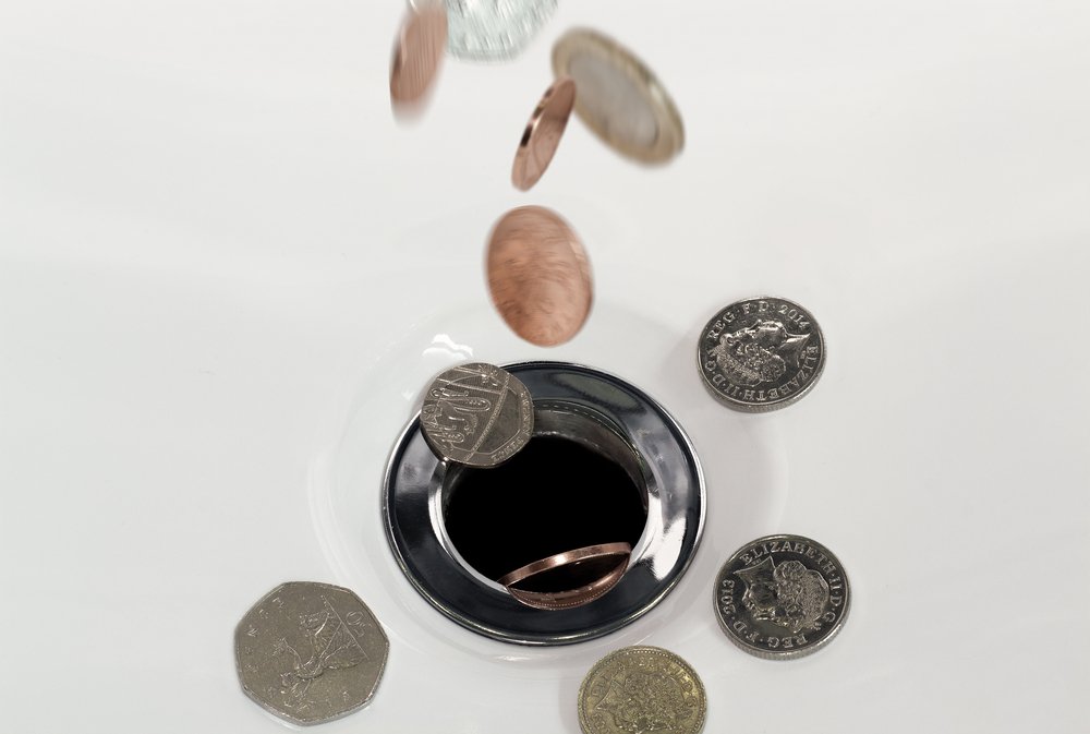 Coins Falling Down the Drain Coins Falling Down the Drain