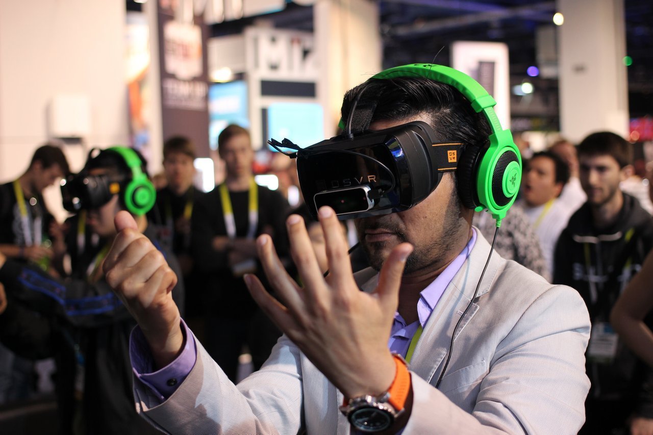 man using a VR headset man using a VR headset
